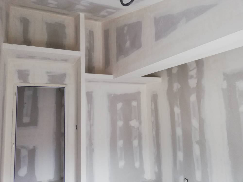 Isolation et plaque de plâtre par l'intérieur, pour création de logements 5-min